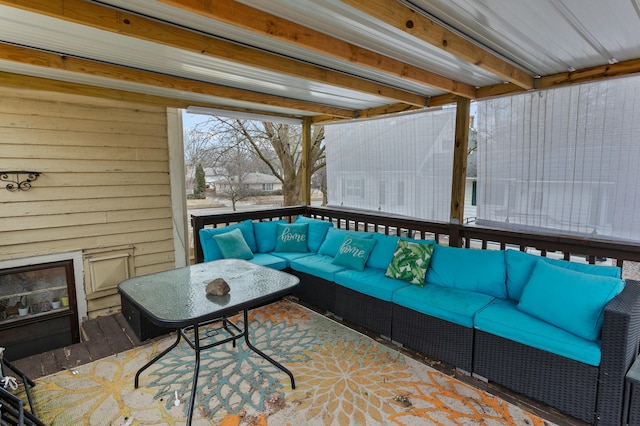 sunroom / solarium with beamed ceiling