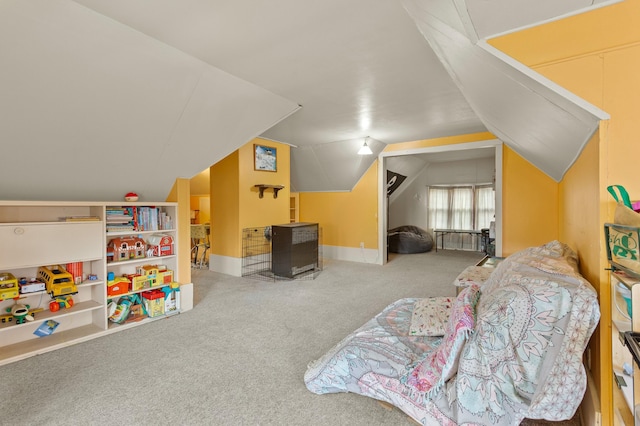 carpeted bedroom featuring vaulted ceiling