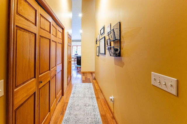7016 Hyde Park Rd, Whitehall, MI 49461 - corridor featuring light wood-style floors