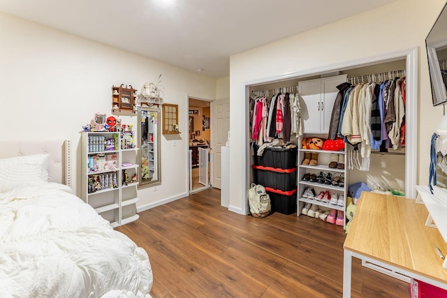 7016 Hyde Park Rd, Whitehall, MI 49461 - bedroom featuring a closet and wood finished floors