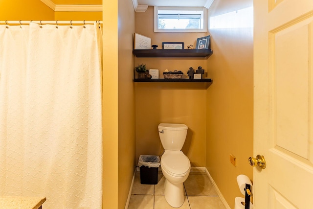 7016 Hyde Park Rd, Whitehall, MI 49461 - full bathroom featuring toilet, tile patterned flooring, crown molding, a shower with shower curtain, and baseboards