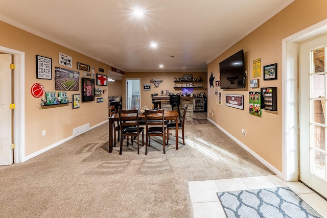 7016 Hyde Park Rd, Whitehall, MI 49461 - dining space with ornamental molding, light colored carpet, recessed lighting, baseboards, and healthy amount of natural light