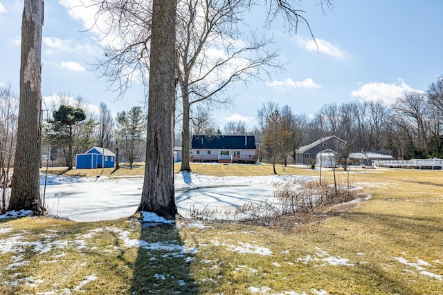 view of yard layered in snow