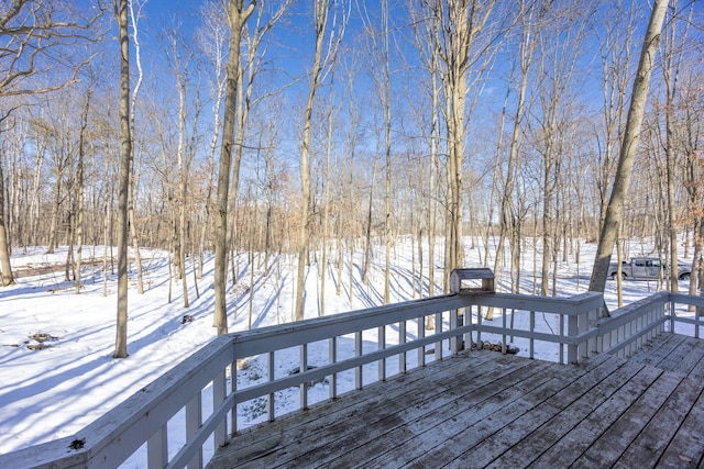 view of snow covered deck