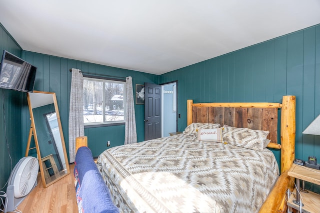 bedroom with wood finished floors