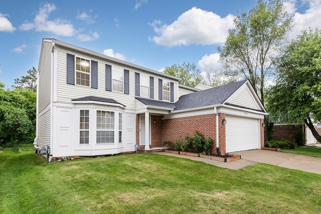 3048 Turnberry Ln, Ann Arbor, MI 48108 - traditional-style house with an attached garage, driveway, brick siding, and a front yard