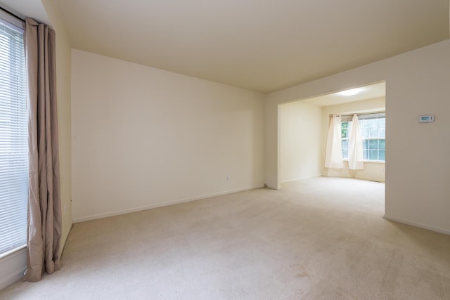 3048 Turnberry Ln, Ann Arbor, MI 48108 - spare room with light colored carpet and baseboards