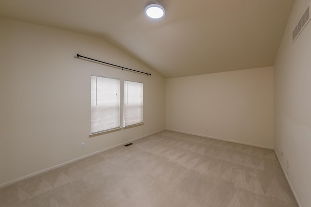 3048 Turnberry Ln, Ann Arbor, MI 48108 - additional living space with lofted ceiling, light carpet, and baseboards