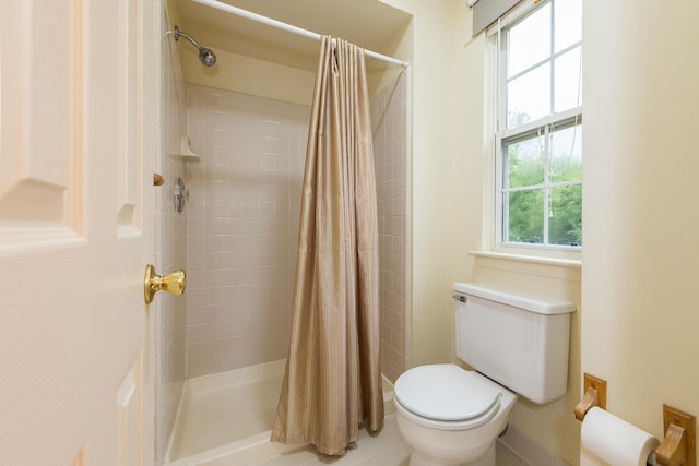 3048 Turnberry Ln, Ann Arbor, MI 48108 - bathroom with toilet and tiled shower