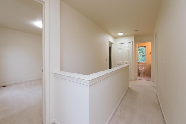 3048 Turnberry Ln, Ann Arbor, MI 48108 - corridor with light carpet, an upstairs landing, and baseboards