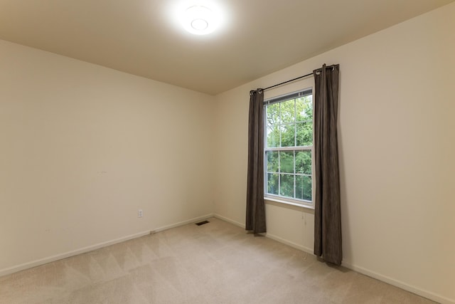 3048 Turnberry Ln, Ann Arbor, MI 48108 - empty room with light carpet, healthy amount of natural light, and baseboards