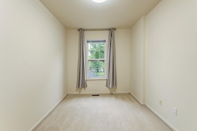 3048 Turnberry Ln, Ann Arbor, MI 48108 - spare room featuring baseboards and light carpet