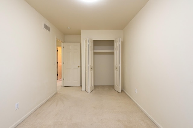 3048 Turnberry Ln, Ann Arbor, MI 48108 - unfurnished bedroom featuring light carpet and baseboards