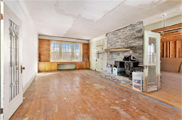 11333 Stony Creek Rd, Milan, MI 48160 - unfurnished living room featuring wood-type flooring