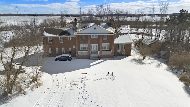 11333 Stony Creek Rd, Milan, MI 48160 - view of front of home with a chimney and brick siding