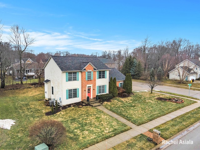 view of front of property with a front lawn