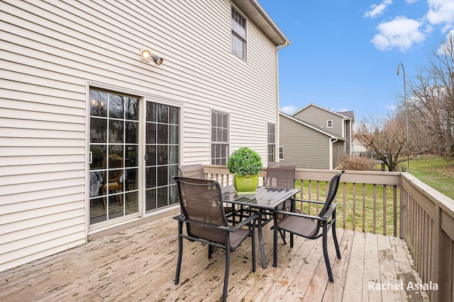 deck featuring outdoor dining space