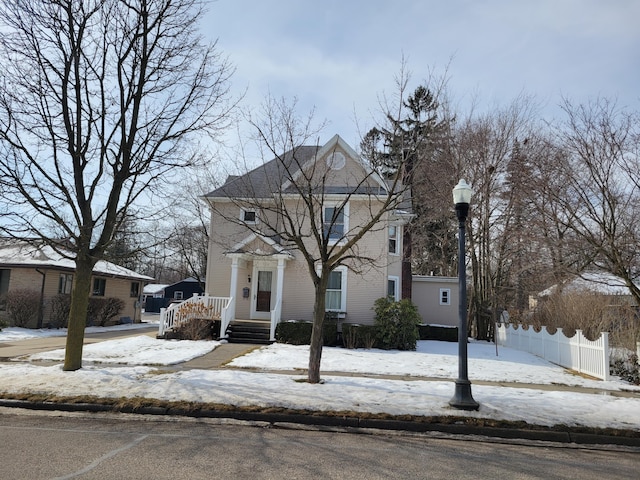 view of front of property with fence