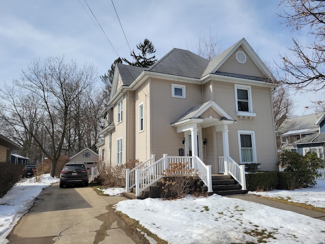 view of front of house with an outbuilding