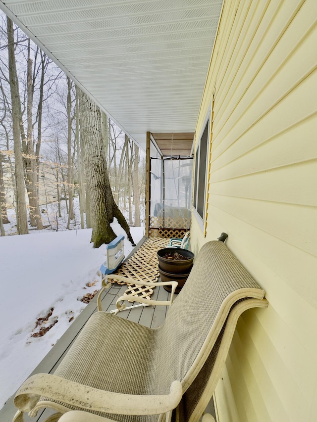 view of snow covered patio