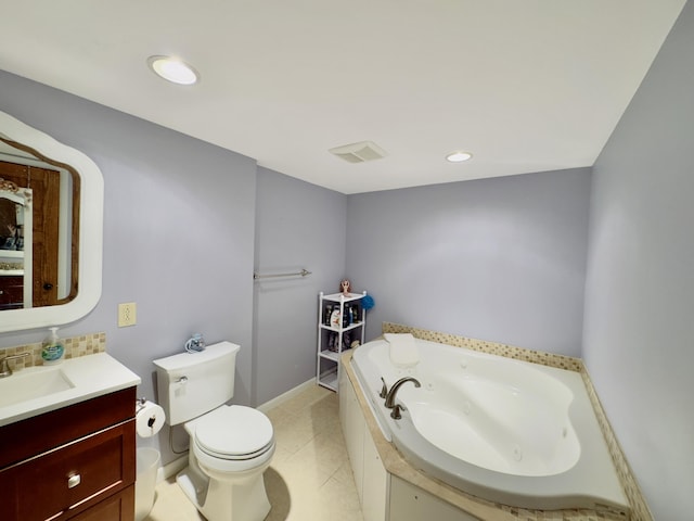 full bathroom featuring recessed lighting, toilet, vanity, a tub with jets, and tile patterned floors