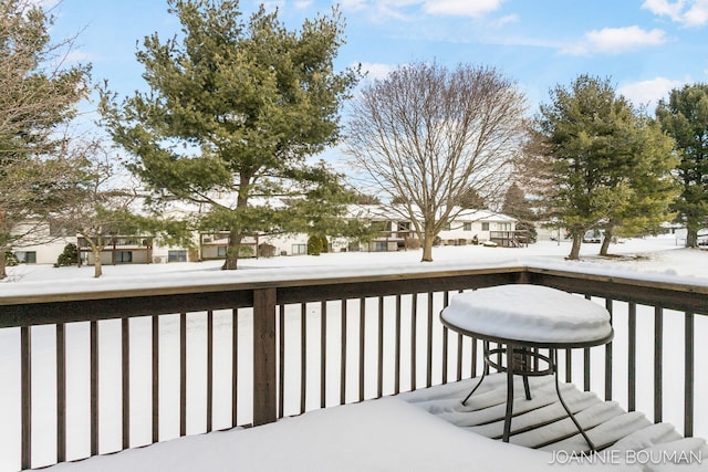 view of snow covered deck