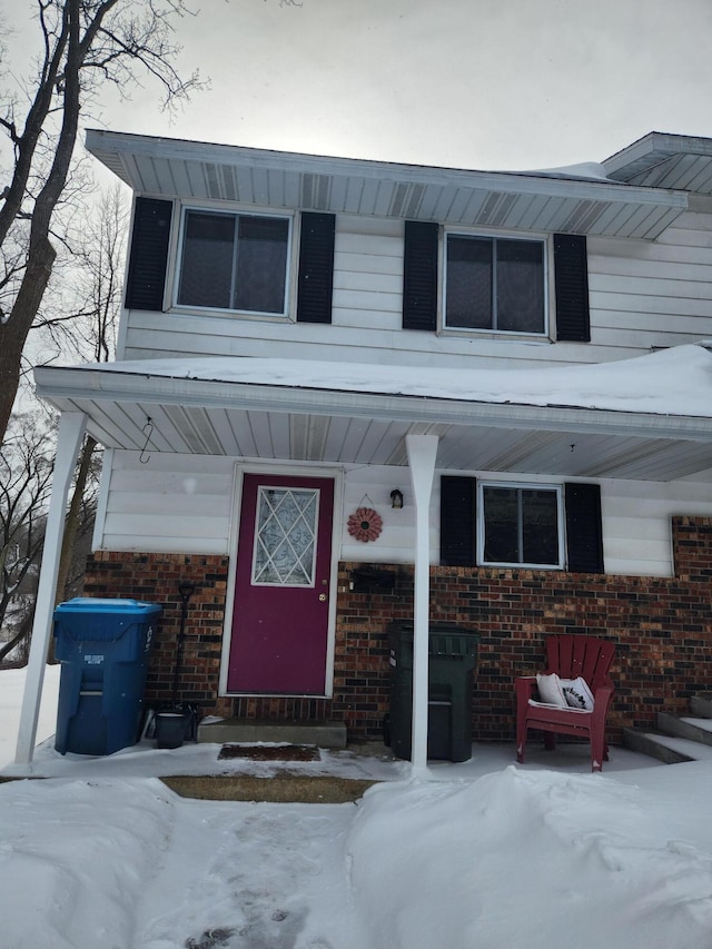 view of front of property with brick siding