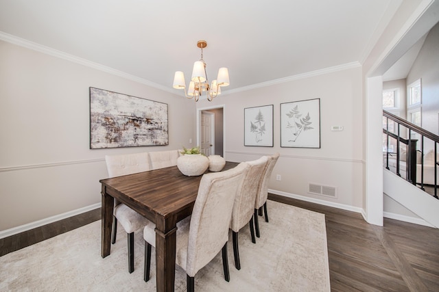 dining space featuring stairway, baseboards, visible vents, and crown molding