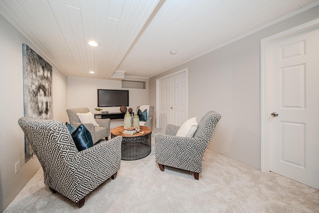 living area featuring carpet floors, wood ceiling, and recessed lighting