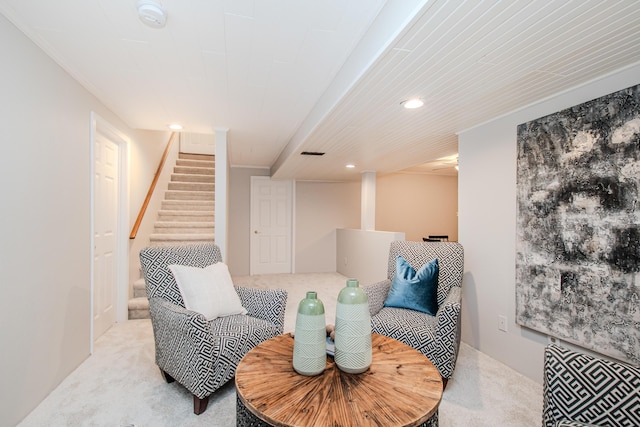 living area featuring recessed lighting, light carpet, visible vents, and stairs