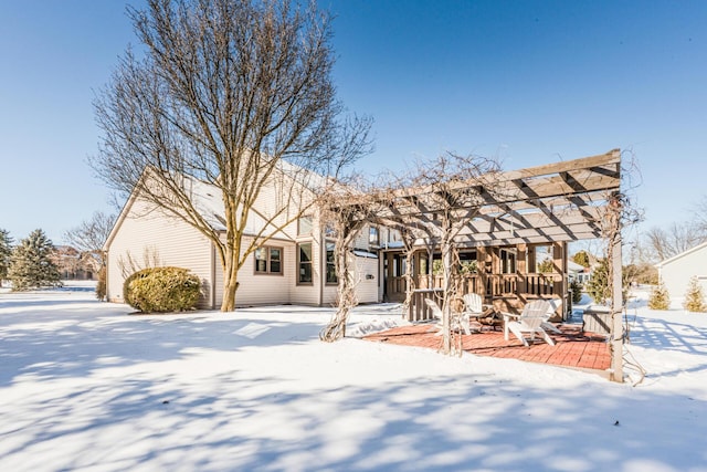 view of front of home featuring a pergola