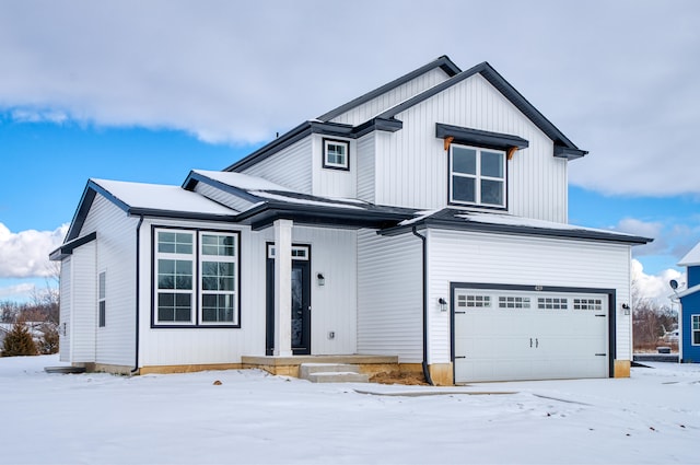 modern farmhouse style home featuring a garage