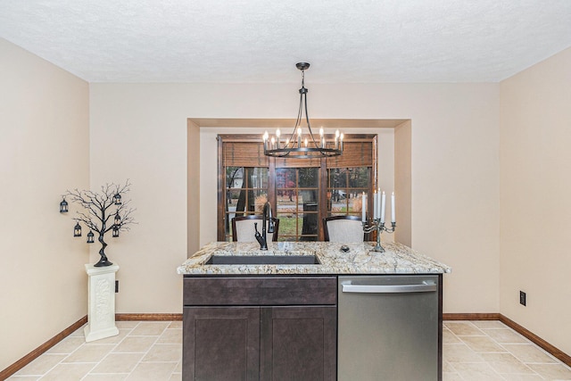 bar featuring baseboards, decorative light fixtures, a sink, and stainless steel dishwasher