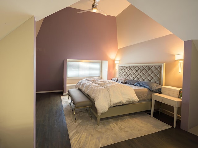 bedroom with ceiling fan, high vaulted ceiling, and wood finished floors