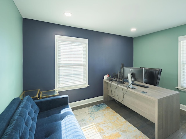 home office with dark wood-type flooring, a wealth of natural light, baseboards, and recessed lighting