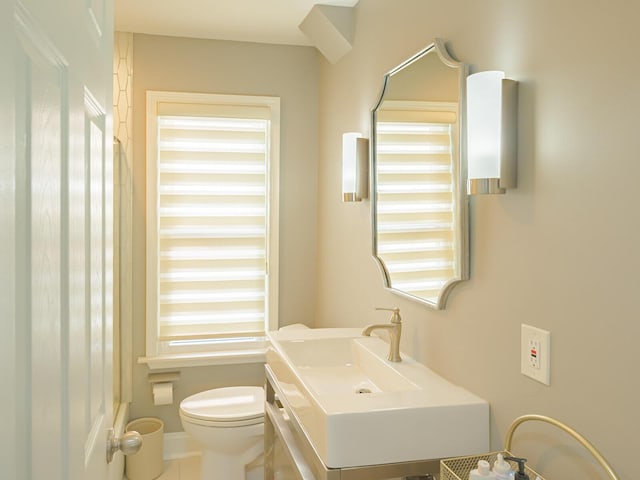 bathroom featuring vanity, toilet, and tile patterned floors