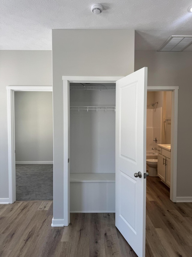 closet featuring visible vents