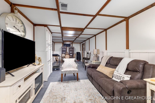 living room featuring visible vents and dark carpet