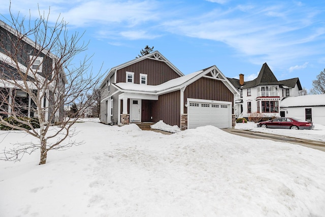 view of front facade featuring stone siding and board and batten siding