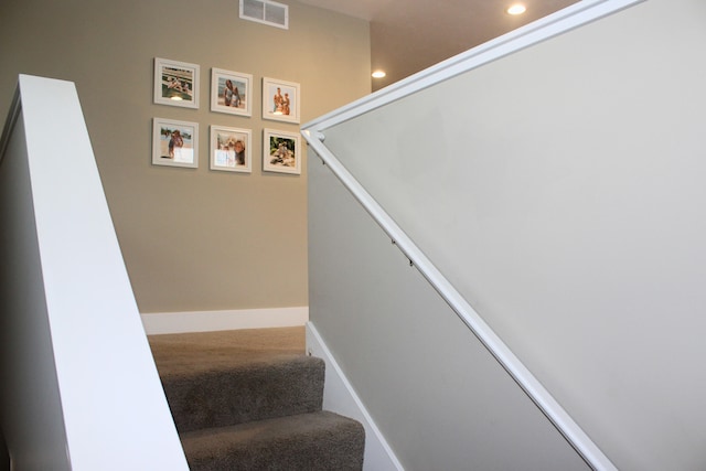 staircase with baseboards, carpet, visible vents, and recessed lighting