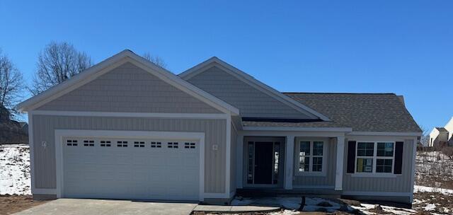 view of front of house with driveway and an attached garage