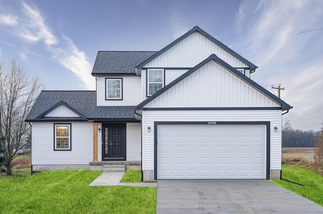 modern farmhouse style home featuring a garage, a shingled roof, a front lawn, and concrete driveway