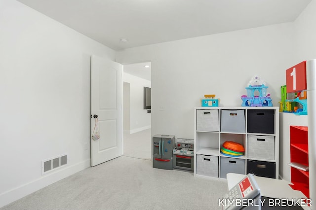 game room featuring baseboards, visible vents, and carpet flooring