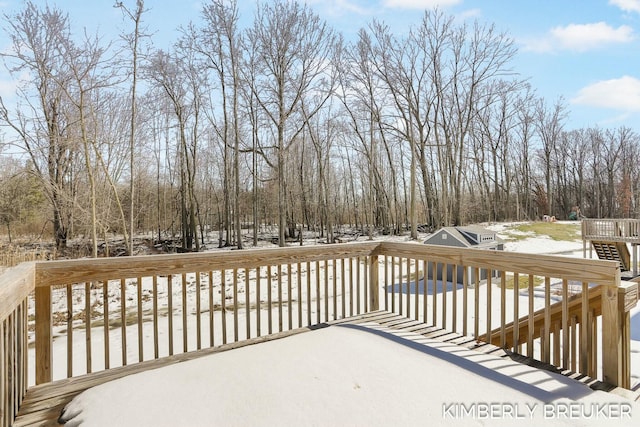 view of snow covered deck