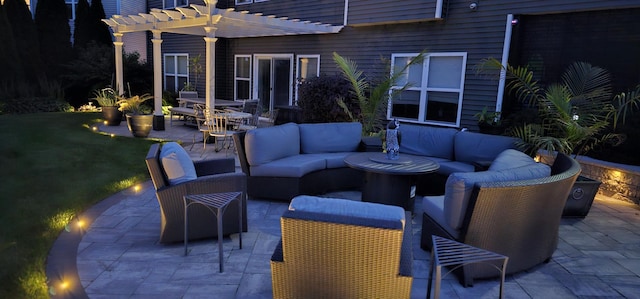 view of patio with an outdoor living space and a pergola