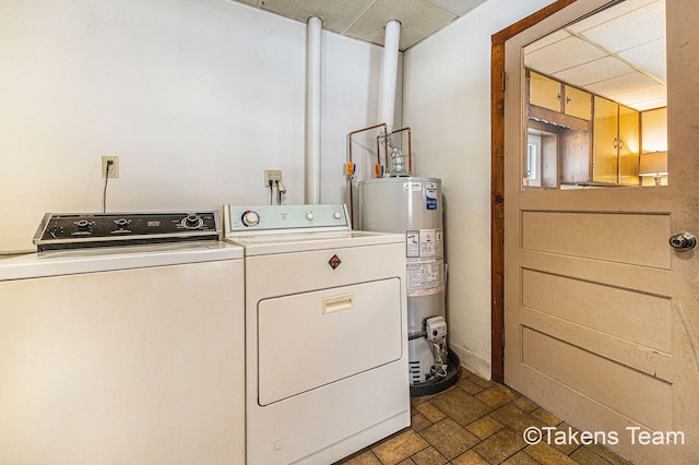 laundry area featuring laundry area, separate washer and dryer, and gas water heater