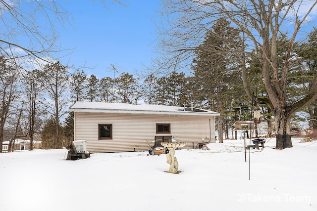 view of snow covered property