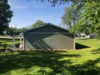 view of outbuilding with an outbuilding