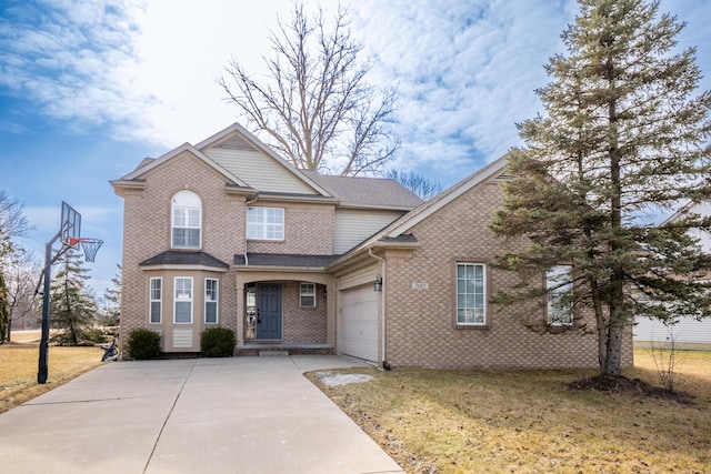 traditional-style house with a garage, a shingled roof, a front lawn, and concrete driveway