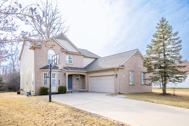 traditional home featuring a garage, driveway, and a shingled roof